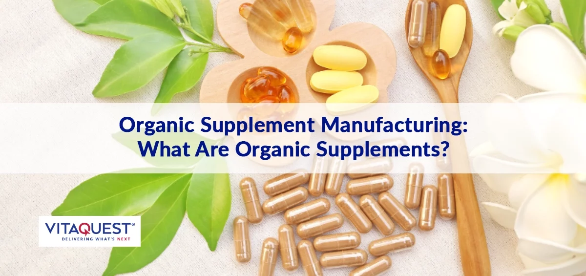 organic supplement capsules, tablets and softgels on a spoon