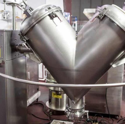 Blending powder in a V-blender is just one of the many steps in the powder supplement manufacturing process.